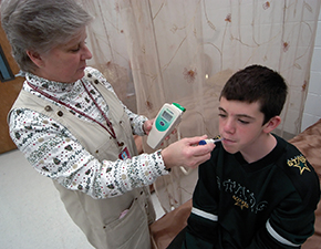 Ideally, a qualified school nurse should be in every school. AAP News photo by Jeff Knox